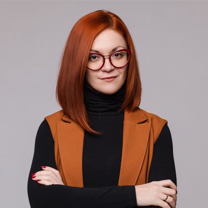 portrait of smiling red haired business woman in g 2021 09 03 06 34 51 utc.jpg