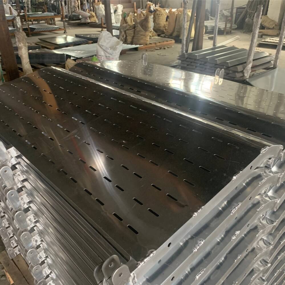 Stack of heavy-duty, precision CNC machined aluminum pergola components with mounting brackets, demonstrating our in-house fabrication and welding capabilities.