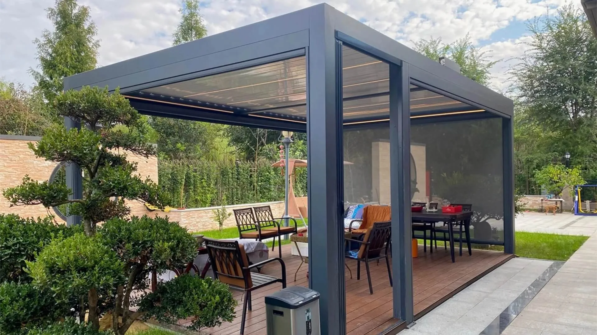 High-end custom bioclimatic aluminum pergola installation featuring integrated LED lighting and zip screens, showcasing our premium outdoor living solutions for custom B2B projects.