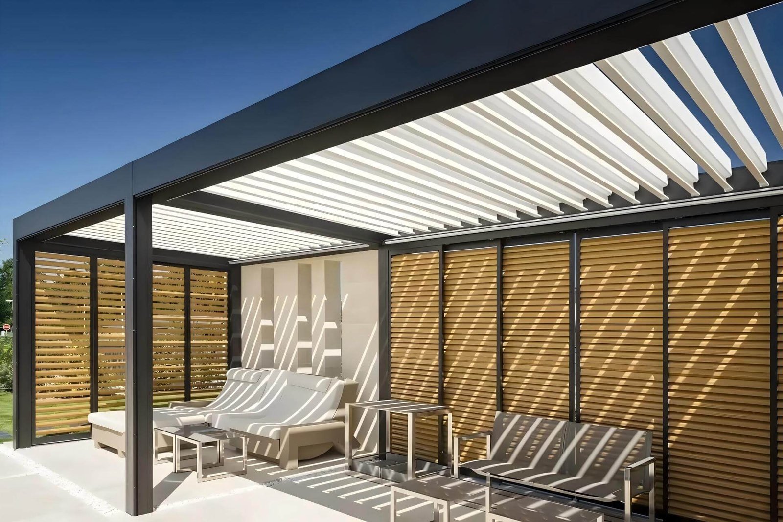 Premium custom aluminum bioclimatic pergola featuring a dark frame, white adjustable louvers, and wood-grain sliding panels, showcasing our expert OEM and ODM manufacturing capabilities for global outdoor brands.