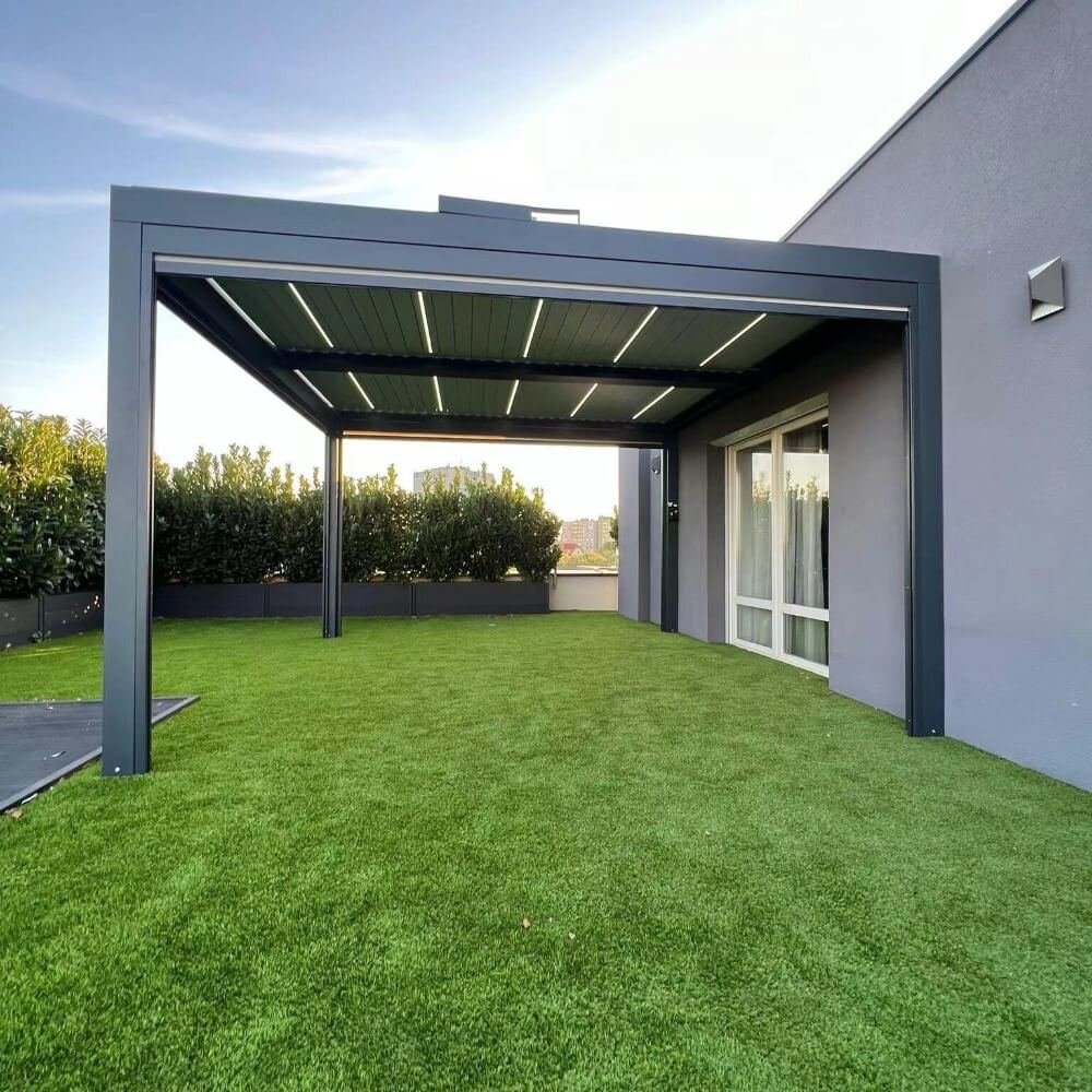 Modern wall-mounted aluminum louvered pergola featuring integrated LED strips, seamlessly extending the living space of a contemporary home in Australia.