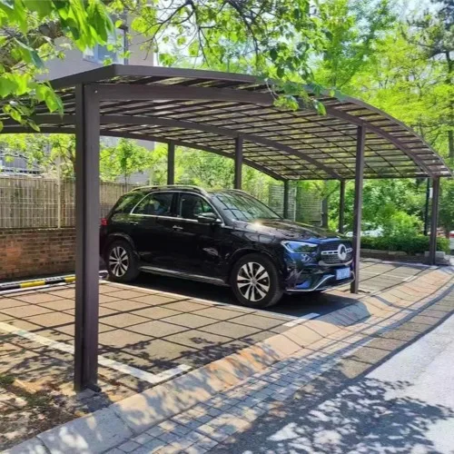 A classic arched roof aluminum carport protecting a luxury SUV, designed with heavy-duty aluminum extrusions to effectively shed heavy snow and withstand strong winds.