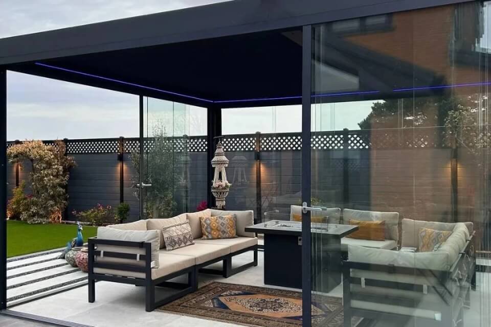 modern motorized aluminum pergola with integrated led lighting installed in a los angeles backyard